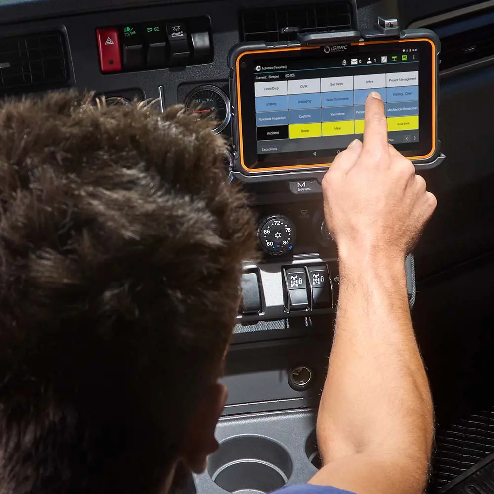 Driver using predictive workflow interface from ISAAC Truck driver interacting with predictive workflow screen on ISAAC’s in-cab tablet